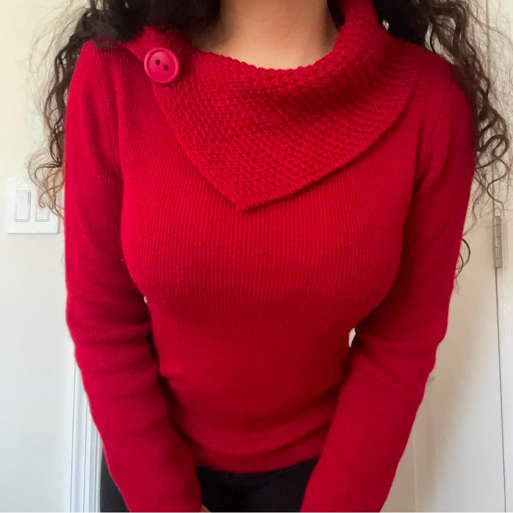Red sweater with a small loose turtle neck and a cute button